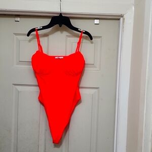 Large, pink, bodysuit